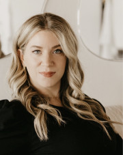 Headshot of blonde woman with fair skin