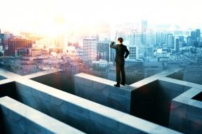 Businessperson on maze wall