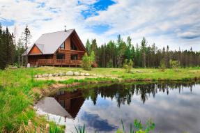 A-Frame log cabin by a lake