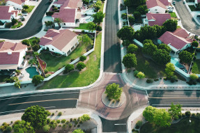 Aerial shot of red-roofed suburban homes