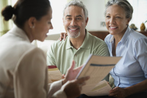 Agent explaining documents to clients