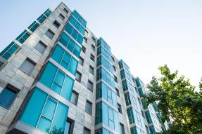 Apartment building with blue windows