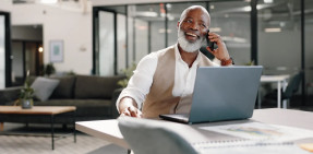 businessman talking on phone in office