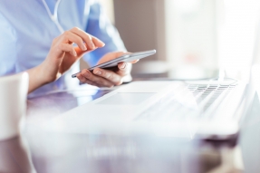 Businesswoman Using Smartphone