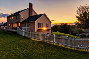 Beautiful colonial American house at sunset