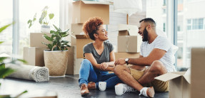 Young couple moving into house