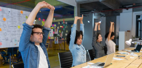 Workers stretching at the office