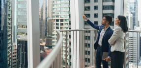 Agents pointing to buildings