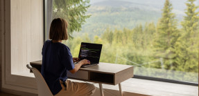 Women working on laptop in remote location