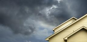 Dark clouds over roof