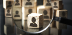 Silhouettes on cube boxes and magnifying glass