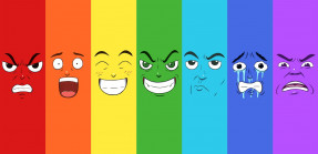 Set of seven faces expressing different emotions in a rainbow pattern