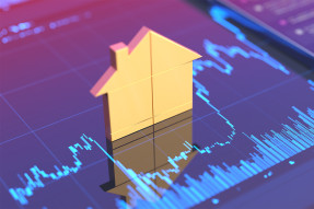 House cutout on screen showing line graph