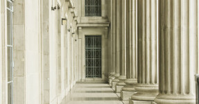 Outdoor corridor with stone columns