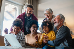 Portrait of a happy multigenerational multiethnic family at home.