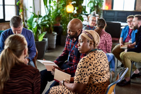 People having a discussion during a conference workshop