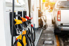 Pickup truck at gas pumps