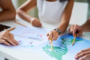 People looking at a research data map