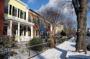 Row houses on a snowy street