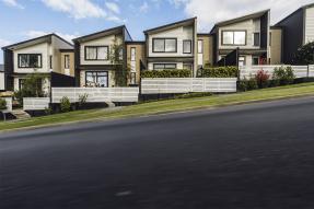 Row of houses on a pitched street