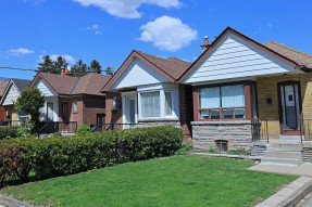 Row of small brick bungalows