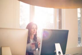 Small Business Office Woman at Computer