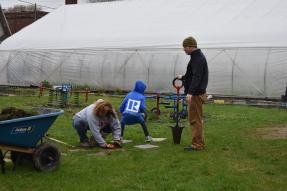 Lansing, MI, Pop-Up Park - realtors planting a tree in the park