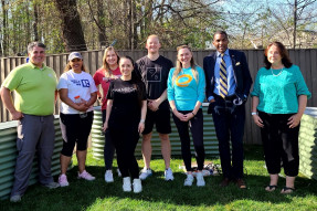 NVAR staff and partners in community garden on the west side of Richmond Highway in Alexandria, VA