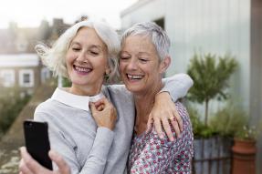 Two older women taking a selfie