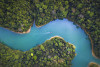 Aerial view of a river through the woods