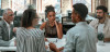 group of people meeting around table