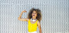 Young woman flexing muscles