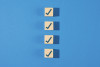 Vertical check boxes on blue background