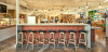 Tiny Grocer interior, counter with stools